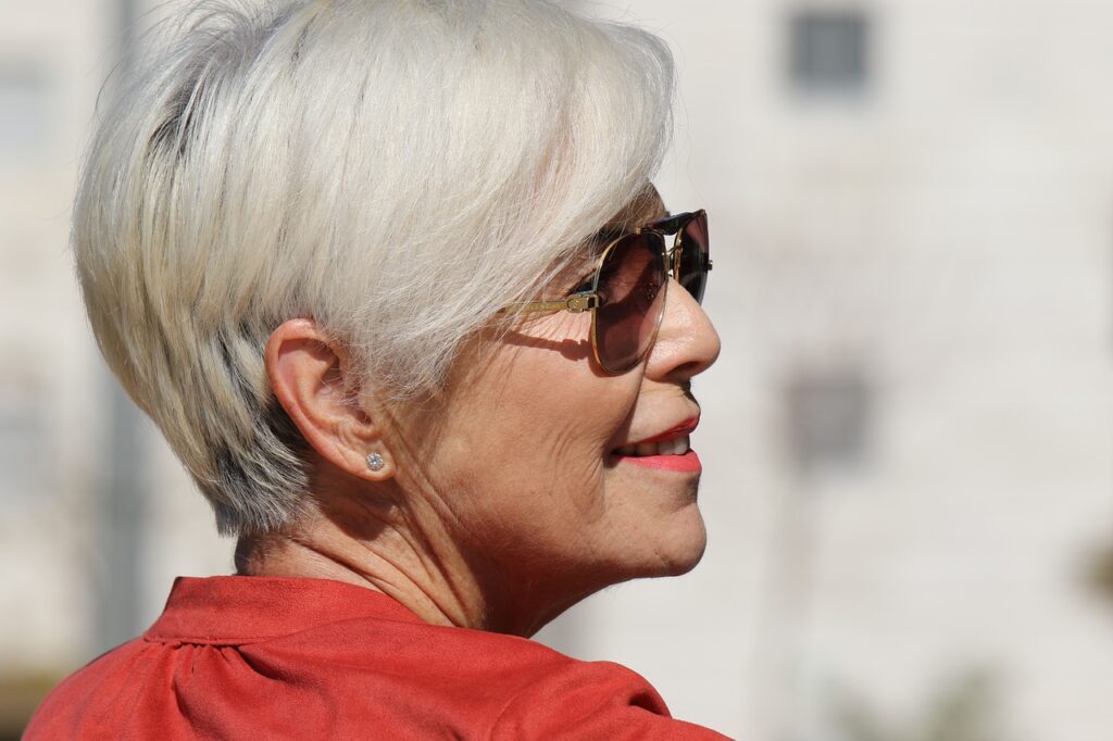 Older woman outside wearing sunglasses