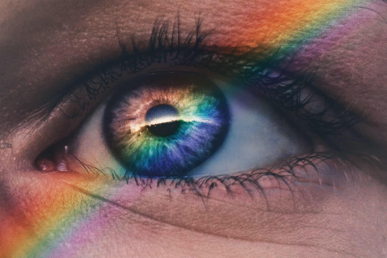 Eye with rainbow over it