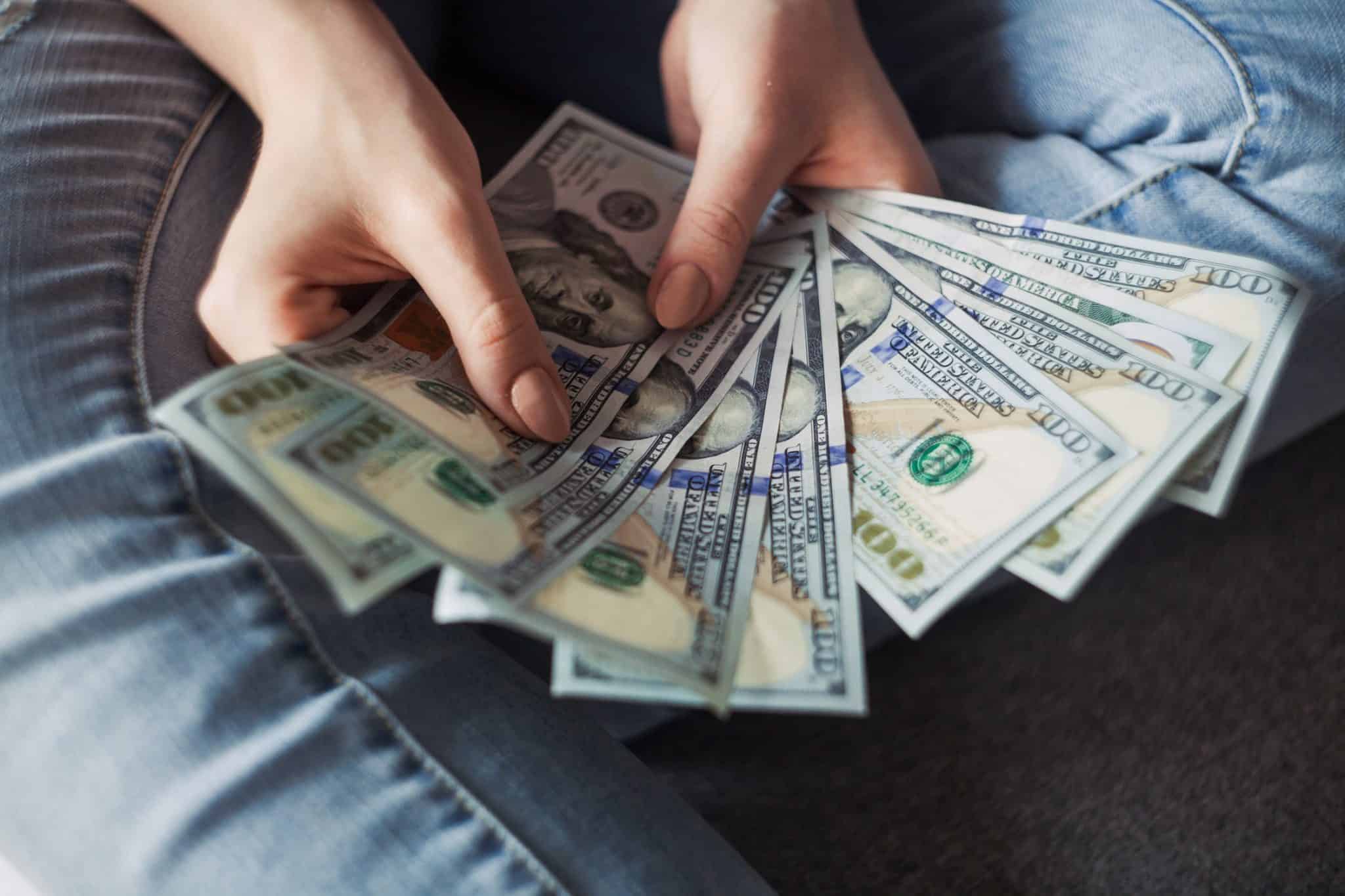 Woman's hands with money