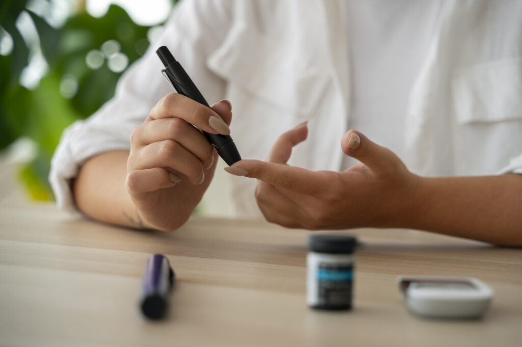 Woman checking her blood sugar.